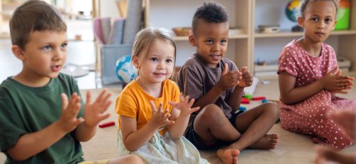 group-of-small-nursery-school-children-sitting-on-2023-11-27-04-49-11-utc